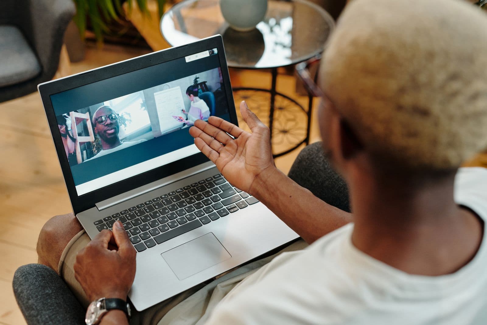 Coach speaking with a client during an online coaching consultation